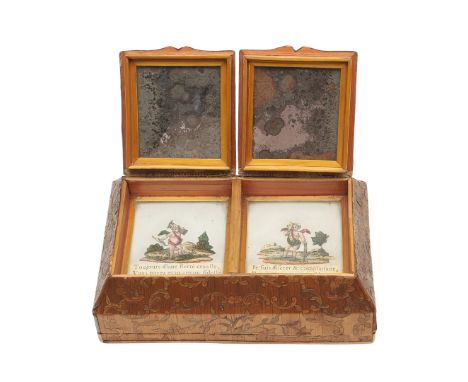 A NAPOLEONIC PRISONER OF WAR STRAW WORK BOX. with all over foliate scroll decoration, the twin domed and mirrored lids openin