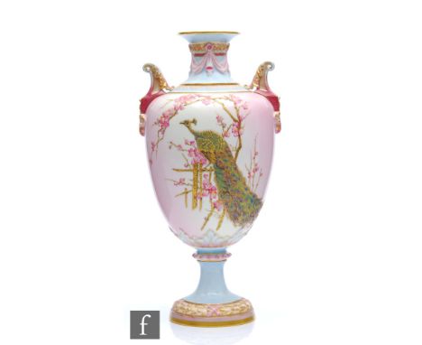 A large Royal Worcester Prismatic Enamels shape 1482 vase, decorated by Edward Raby with a gilt and enamel peacock perched on