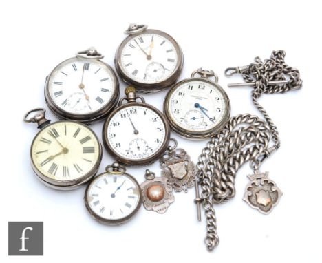 Six hallmarked silver open faced pocket watches to include a verge example, a continental silver and a white metal example wi