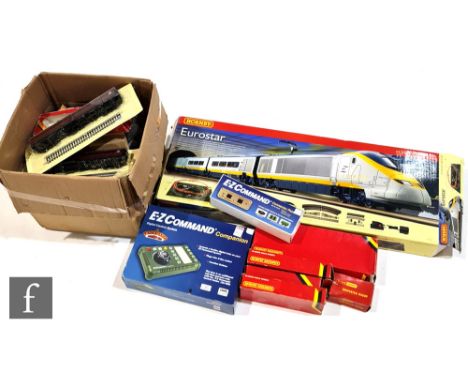 A collection of OO gauge model railway, to include a Hornby R1071 Eurostar train set, with assorted rolling stock and scenic 
