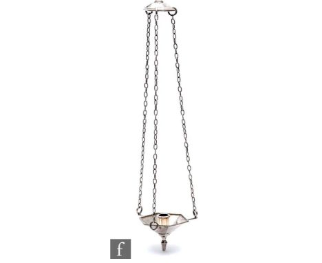 An early 20th Century Arts and Crafts silver plated hand beaten hanging candlestick, the hexagonal sconce with a rope twist b