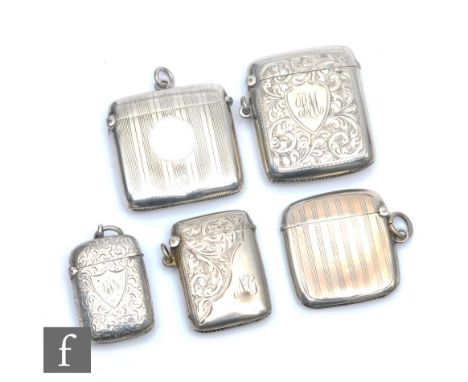 Five assorted hallmarked silver rectangular vesta cases to include foliate and engine turned examples, various dates and styl