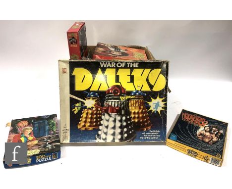 A collection of assorted Doctor Who toys and games, comprising Denys Fisher War of the Daleks, five Waddingtons puzzles, nine