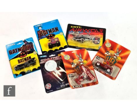 A collection of ERTL television and film related diecast models, Airwolf Helicopter, Bugs Bunny Plane, Batman Joker Van, Batm