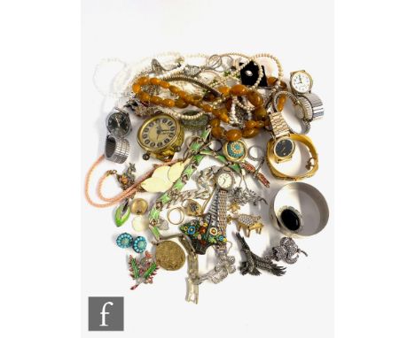 A parcel lot of assorted costume, silver and other jewellery to include a silver bracelet and bangle, watches, beads, earring