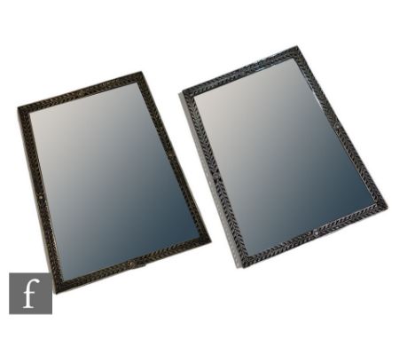 A pair of large easel mirrors each in a plated leaf surround, 56cm x 46cm, one A/F. (2) 
