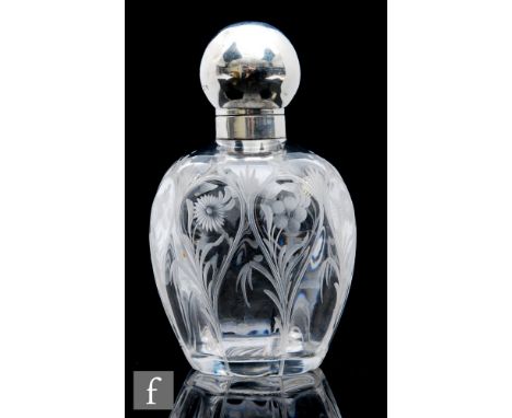 An early 20th Century Stevens &amp; Williams clear crystal glass scent bottle, the shouldered ovoid body with skeletal molded