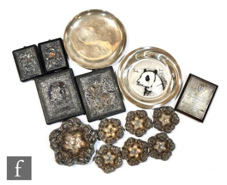 Two continental silver shallow dishes, four modern silver mounted Greek Icons, a set of seven silver Sterling silver bon bon 