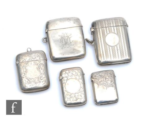 Five assorted hallmarked silver rectangular vesta cases to include foliate and engine turned examples, various dates and styl