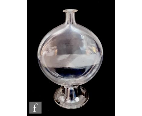 A 19th Century clear crystal glass reflecting globe of compressed ovoid form with shallow collar neck, raised to a domed and 
