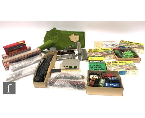 A collection of assorted OO gauge model railway accessories, to include boxed and unboxed rolling stock by Lima and Triang, s