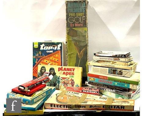 A collection of assorted toys and board games, to include Arrow Planet of the Apes, Ariel Wembley, Marx Arnold Palmer's Pro S