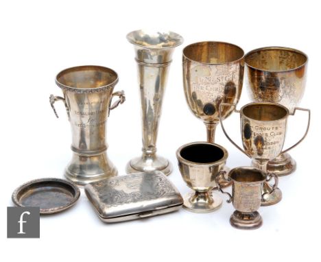 A parcel lot of assorted hallmarked silver items to include trophies, cigarette case, condiment etc, total weight of weighabl