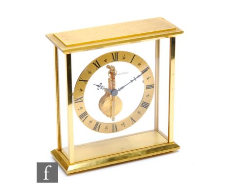 A mid 20th Century or later brass skeleton mantle clock, Jaegar-Le Coultre, circular dial, fixed key wind, height 17cm. 