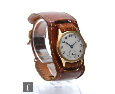 A 9ct hallmarked manual wrist watch, Arabic numerals to a white circular dial, case diameter 28mm, to a leather strap, Cheste