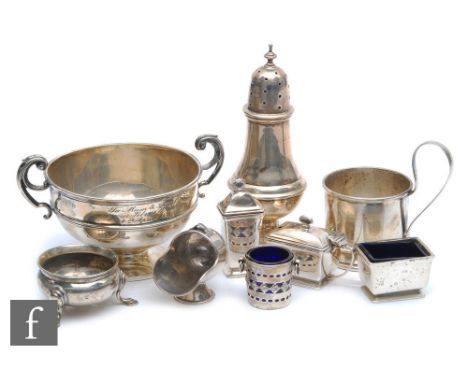 A parcel lot of assorted hallmarked silver items to include a sugar castor, a three piece cruet, a twin handled small bowl et