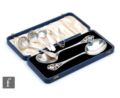 A cased pair of hallmarked silver serving spoons with pierced terminals, Sheffield 1947, Viners, with four further items of s