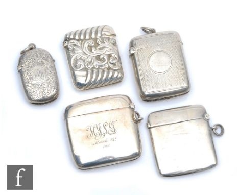 Five assorted hallmarked silver rectangular vesta cases to include plain, foliate and engine turned examples, various dates a