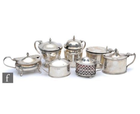 Seven hallmarked silver assorted mustard pots to include plains, pedestal and pierced examples, total weight 14oz (excluding 