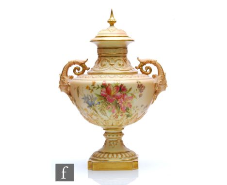 A Royal Worcester blush ivory shape 1372 vase and spire cover decorated with flowers and foliage within moulded borders, with