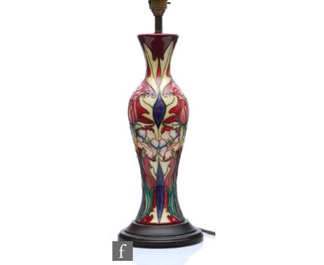 A Moorcroft Pottery lamp decorated in the Masquerade pattern designed by Rachel Bishop, marks obscured by affixed wooden plin