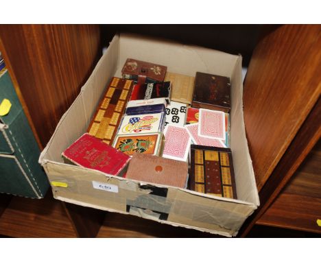 A box of assorted vintage card games including Lexicon and Cribbage