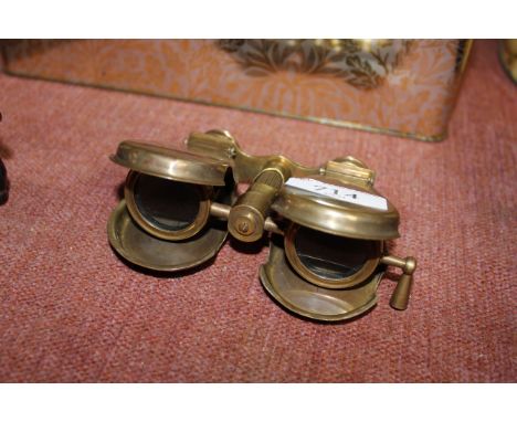 A brass folding binocular