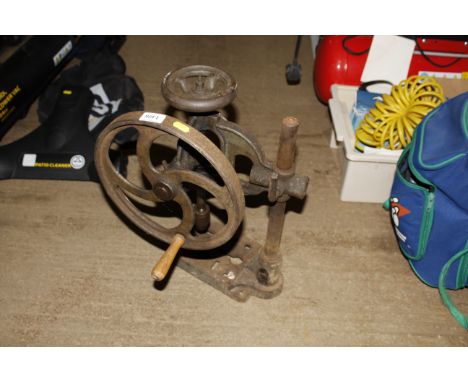 A hand powered pillar drill
