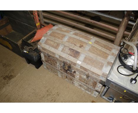 A metal and wooden bound dome topped trunk