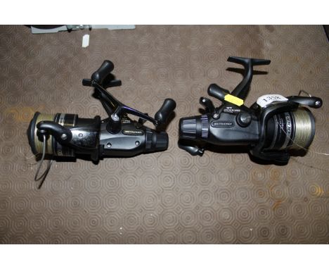 A pair of Shimano ST6000 RB bait runner fishing reel