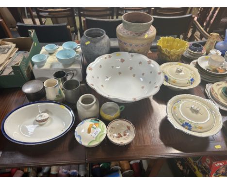 A large rose decorated china wash basin, a pair of Art Deco tureens, Majolica type jardinière, pottery vases etc.