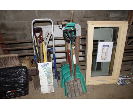 A quantity of gardening tools to include shovels, forks, spade