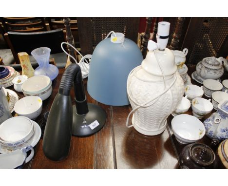 A white glazed pottery table lamp, a pendent ceiling and a modern adjustable desk lamp