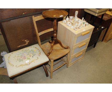 A mahogany tripod table; and an elm rail back chair 