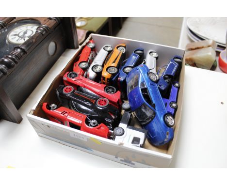 A box of model 1/24 scale model cars