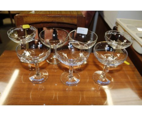 Three Babycham saucers and four others 