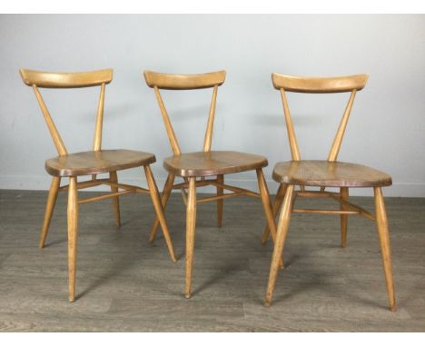 SET OF ERCOL SIX BLOND BEECH AND ELM SINGLE CHAIRS, with curved backrest, dished seat, on spindle legs joined by an 'H' stret