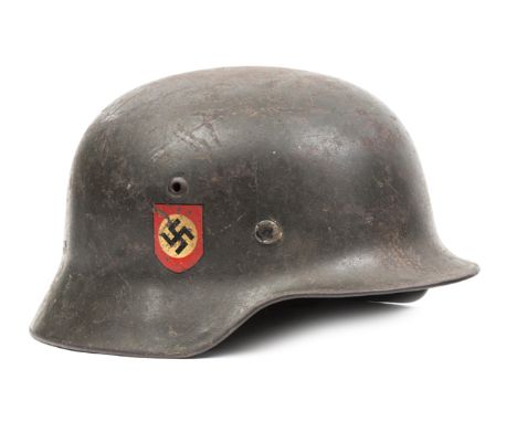 A Third Reich M35 double decal Police combat helmet, dark grey/green with national and unbordered Police decals, by ET (Eisen