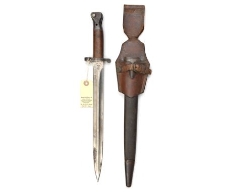 A P1888 Mk 2 bayonet,  oil hole in pommel with 2 brass studs, various stamps and date 3’02 at forte, in scabbard with brown l