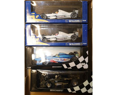 4 Minichamps 1:18 scale Formula 1 racing cars. 2x Williams BMW F1 Team – FW22 Ralf Schumacher and Jensen Button. Plus a JPS L