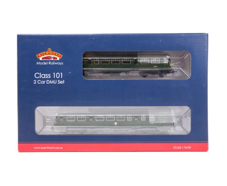 A Bachmann 101 2-car DMU set. A BR suburban pair, power car and non-powered both in dark green livery with cats whiskers to f