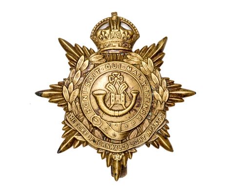 A brass star valise badge of the 2nd Bn D of Cornwall’s Light Infantry, worn by the battalion in Germany and Guernsey, 1922-2