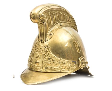 A French fireman’s brass helmet c 1900, brass binding to front and back peaks, studs at back, ear to ear HP embossed with tro