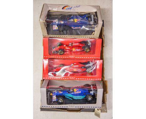 4 1:18 scale Pauls Model Art Formula 1 single seat racing cars. 2x Michael Schumacher Collection 1996 F310 RN1. Plus 2x Heinz