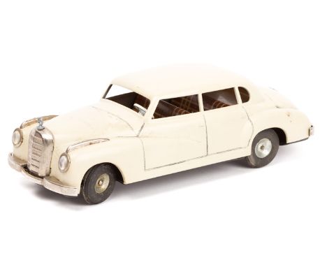 A late 1950’s German JNF large scale, (approx 1:24) tinplate Mercedes Benz 300. A late friction powered example in cream with