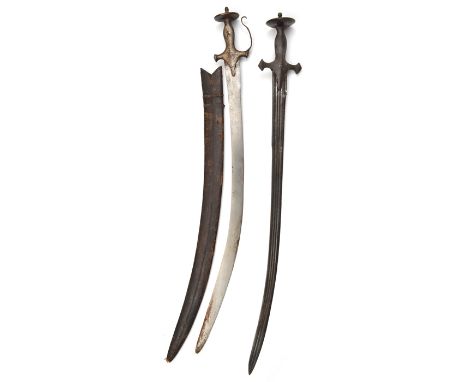 A tulwar,  curved, triple fullered blade 28”, iron hilt with crossguard, langets, dish pommel, shaped grip; and another, plai