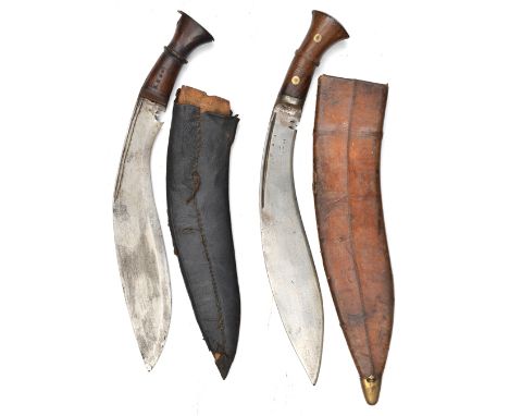 A kukri, the blade stamped with small broad arrow and initials, “9-41” and crude “RPA II”, the plain wood grips secured by tw
