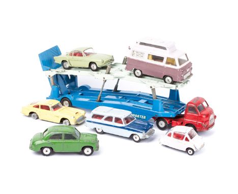 7 Corgi Toys. A Bedford ‘S’ type Carrimore car transporter in two tone blue with red cab. Plus a mechanical Morris Oxford in 