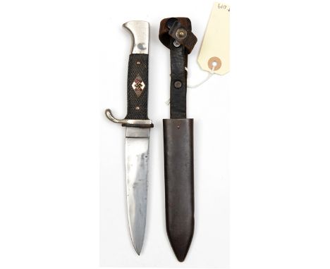 A similar knife,  the plain blade stamped at the forte with RZM mark and “M7/38” (Paul Seilheimer, Solingen), the plated grey