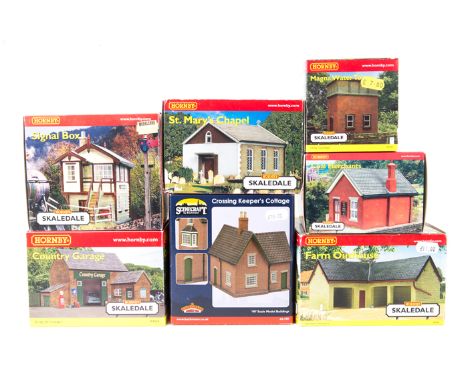 A quantity of Hornby Skaledale lineside buildings and accessories. Farm Outhouse R8783. Signal Box R8534, Engine Shed R8536, 